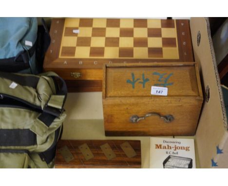 A mixed assortment of vintage games to include chess, back gammon, mahjong.