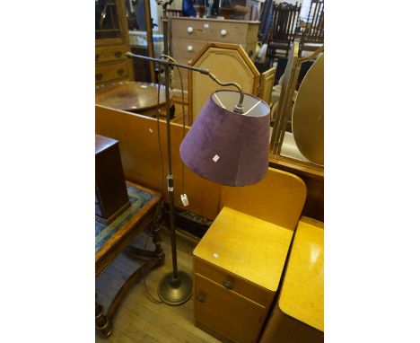 A good quality brass adjustable rotating standard lamp (sold electrically untested).
