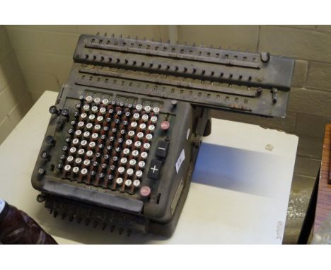 A vintage Muldido of London calculator.