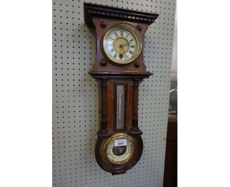 An Edwardian mahogany clock barometer with Junghans clock movement.