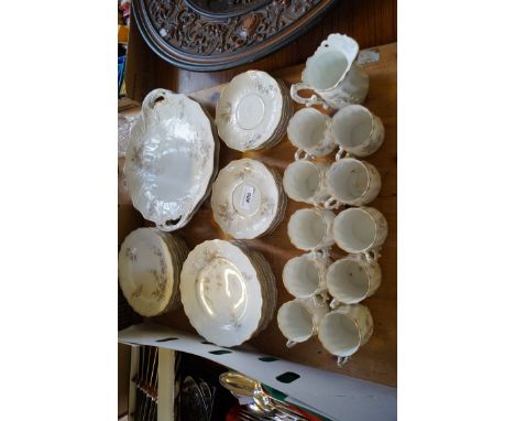 A Pompadour Continental porcelain tea and dinner service, having floral decoration.