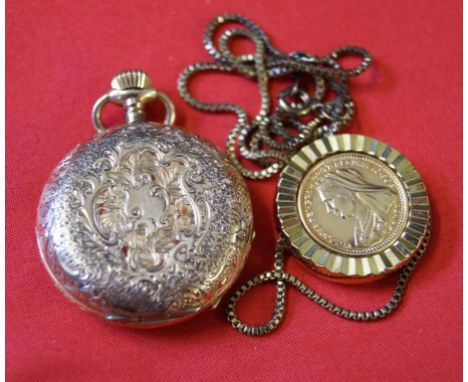 An 14k gold manual wind pocket watch