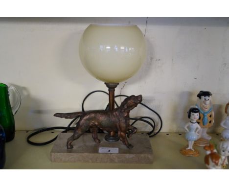 Art Deco table lamp modelled with a gilt spelter setter, raised on marble plinth base.   CONDITION REPORT:  Very minor chip t