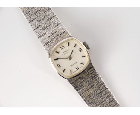 A ladies 9ct white gold Rotary manual wristwatch, the rounded square silvered dial signed 'ROTARY 21 JEWELS SWISS MADE', the 