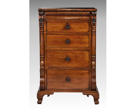 An early Victorian mahogany tall five drawer chest, the deep top on carved floral pendant brackets over turned pilasters, fla