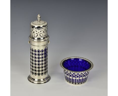 An Edwardian silver lighthouse sugar caster, Haseler Brothers, London 1902, with reticulated quatrefoil decoration and foliat