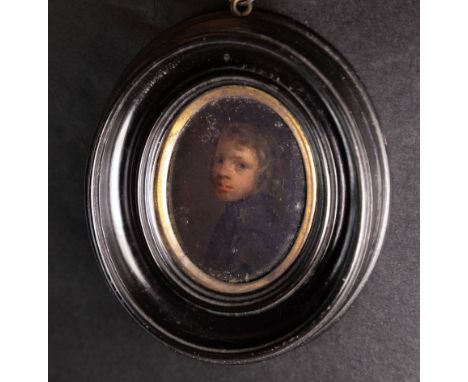 Follower of Sir Joshua Reynolds (British, 1723-1792), Portrait miniature of a boy, wearing a dark jacket, oval oil, 5.3 x 3.9