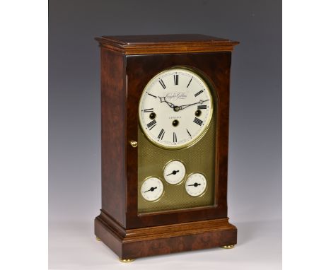 An burr walnut and mahogany calendar clock by Knight & Gibbins of London, late 20th century, ref. PA58W, with eight day three