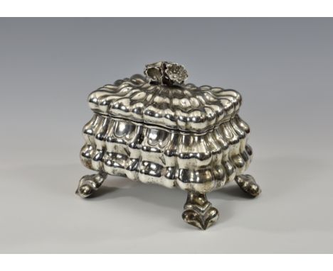 A 19th century Austrian silver tea caddy, Vienna, 1884, maker's mark 'AW', of rectangular lobed bombe form, the hinged lid wi