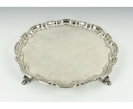 An Elizabeth II silver salver, Mappin & Webb Ltd, Sheffield 1968, of large proportions, plain form with barbed rim, raised on