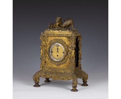 A 19th century French brass mantel clock, with three train movement striking on two gongs, cross hatched gilt dial with silve