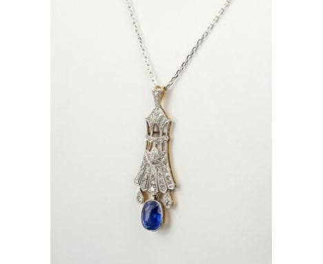 A fine Art Deco platinum, 18ct gold, sapphire and diamond pendant, the oval cut sapphire of fine cornflower blue colour, appr