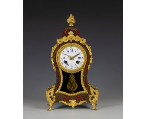 A late 19th century boulle work mantel clock by Hatton of Paris, the balloon shaped case with red tortoiseshell and brass inl