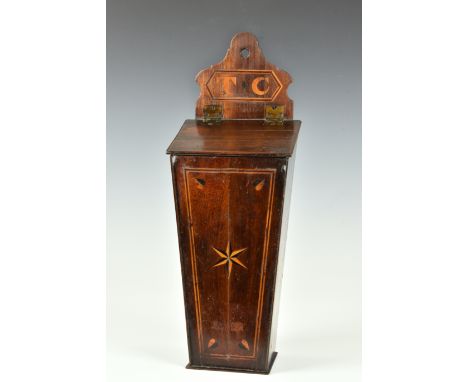 A 19th century mahogany and marquetry inlaid wall hanging candle box, of tapering form, the raised pierced bracket inlaid wit