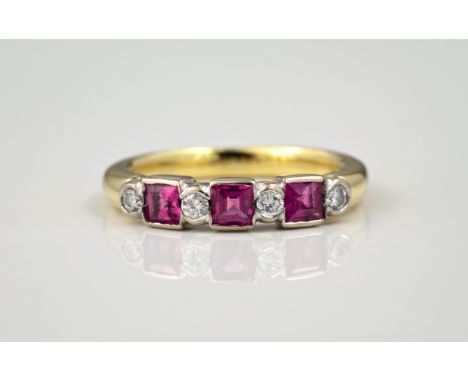 An 18ct yellow gold, ruby and diamond seven stone ring, the three square cut rubies alternating with four brilliant cut diamo