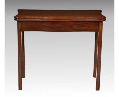 A George III serpentine mahogany foldover card table, with replaced green baize, opening on a gateleg, raised on straight mou