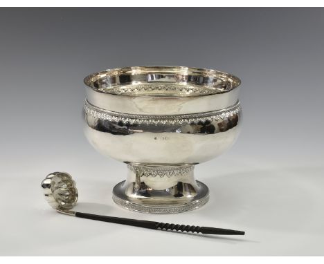 A Victorian silver punch bowl, Goldsmiths & Silversmiths Co., London 1892, of bun urn form, with slightly flared upstanding r