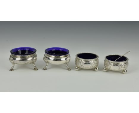Two pairs of Victorian silver cauldron salts, one by Charles Stuart Harris, London 1895, of plain Georgian form with shell an
