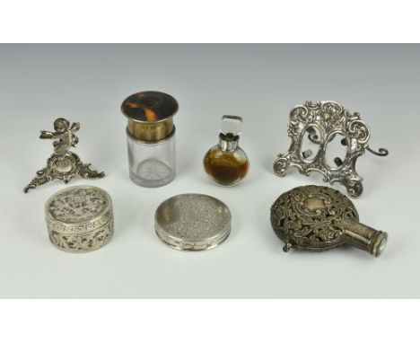 A collection of various silver smalls, including a Victorian silver chased and pierced perfume bottle case, hallmarked for Bi