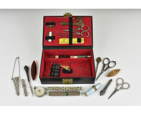 A collection of antique / vintage sewing accessories, comprising a silver gilt blue guilloche enamel bobbin holder, stamped 9