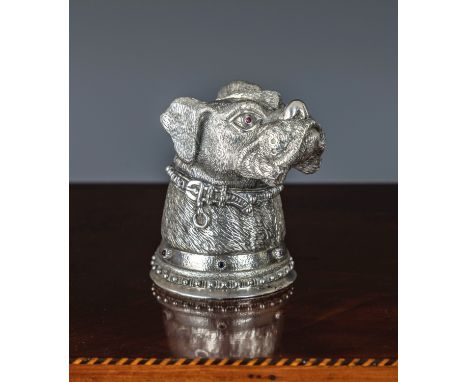 A Russian silver bulldog head paperweight, possibly Fabergé, the finely modelled bulldog with realistic features, cabochon ru
