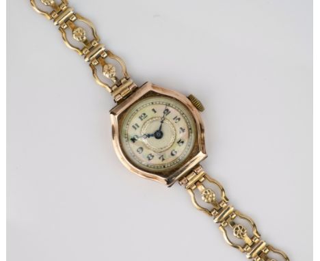 A ladies 9ct rose gold manual wrist watch, hallmarked London 1937, the silvered dial with mother-of-pearl and gilt Arabic cha