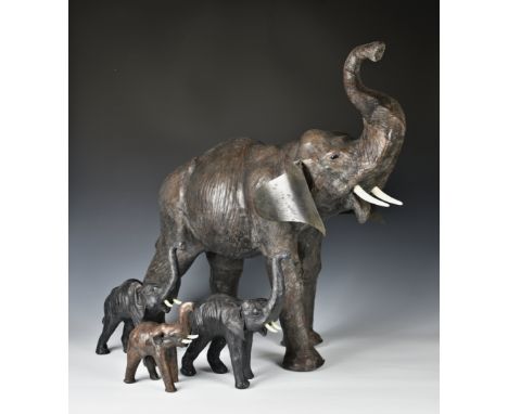 A leather clad study of an elephant with a raised trunk in the style of Dimitri Omersa for Liberty, third quarter 20th centur