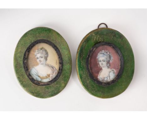 A pair of 19th century French portrait miniatures in shagreen frames, depicting 18th century noblewomen, one signed 'Robin', 