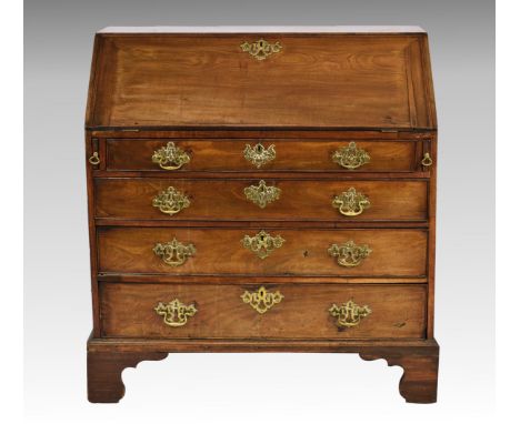 A George III mahogany bureau, the well figured fall front enclosing a fitted interior with central cupboard flanked by blind 