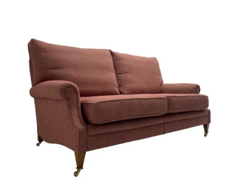 Edwardian design grande two-seat sofa, upholstered in wool herringbone rouge fabric, rolled arms, on square tapering supports