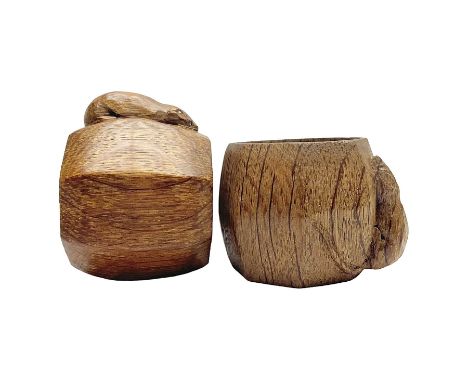 Mouseman - two oak napkin rings, bulbous octagonal form carved with mouse signature, by the workshop of Robert Thompson, Kilb