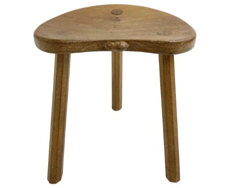 Mouseman - oak three legged milking stool, dished kidney-shaped top on three splayed supports, carved with mouse signature, b