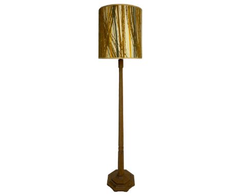 Mouseman - oak standard lamp, octagonal tapered column on octagonal base carved with mouse signature, by the workshop of Robe