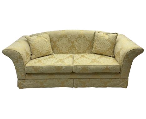 Three-seat hardwood framed sofa, traditional shape with arched cresting rail over rolled arms, upholstered in pale gold and c