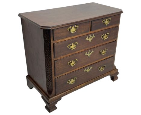 George III Chippendale design mahogany chest, moulded rectangular top with canted corners, wide canted uprights with blind fr