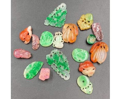 A selection of carved Jade, various colours, seventeen pieces in total.