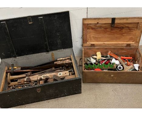 A selection of vintage tools in a wooden storage box 