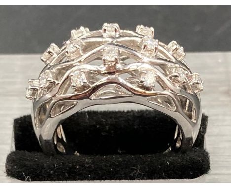 A Diamond dome ring, set in 18ct gold (Approximate Weight 9.9g) (Size M1/2)