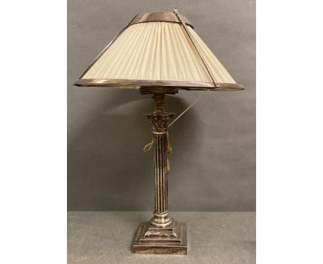 An empire style white metal column table lamp with unusual white metal framed shade. Approx H63cm, initial G.S to base  