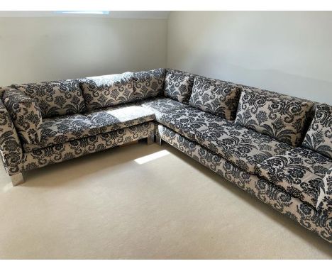 A Designers Guild floral pattern corner sofa, 252cm  x 330cm L x 89  x H 80 x SH 40