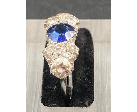 A sapphire and diamond ring, Sapphire stone is approx 0.80cts (Size N1/2)