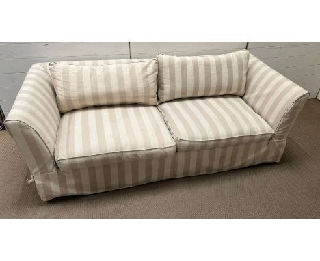 A large two seater sofa with striped loose covers (H72cm W207cm D90cm SH42cm)