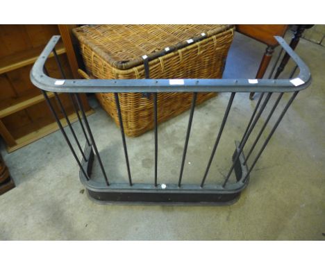 A wrought steel fender 