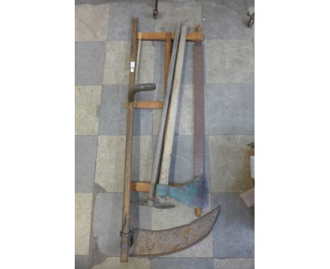 Four vintage farming tools 