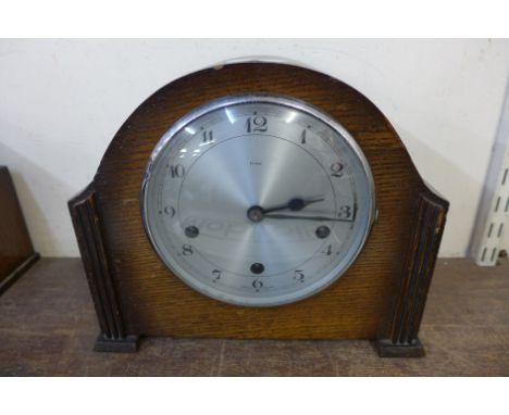 An Art Deco oak mantel clock 
