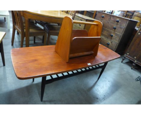 A teak coffee table and a magazine rack 