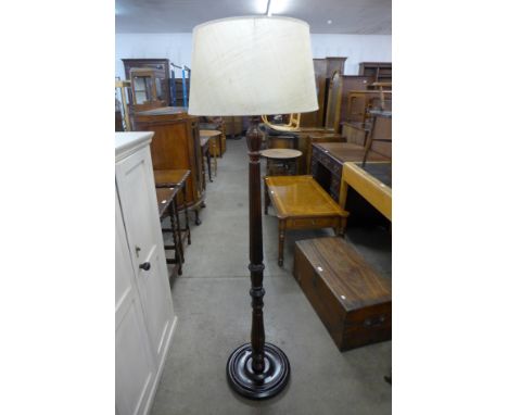 A mahogany standard lamp 