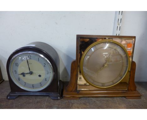 A Bakelite mantel clock and an Art Deco walnut timepiece 