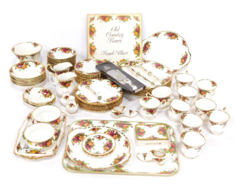 A Royal Albert Old Country Roses pattern part tea and dinner service, comprising placemats, six dinner plates, cased cake sli