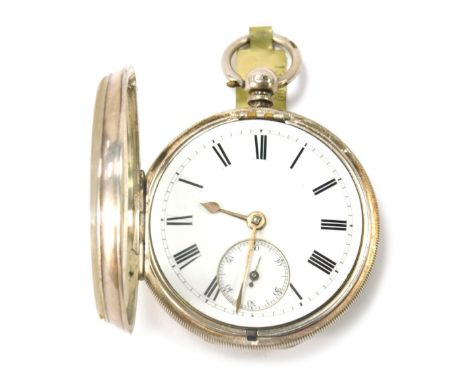 A Victorian silver pocket watch, with white enamel  Roman numeric dial with gold hands and seconds dial, with engine engraved